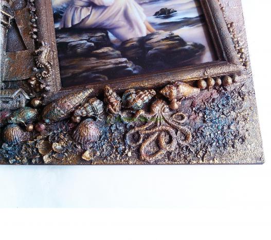 <div style=margin-left:10px><h1>Морская фоторамка Настенный декор интерьера. Морские сувениры</h1><p><a href="/catalog/podarki--suveniry/">Подарунки, сувеніри</a> » <a href="/catalog/podarki--suveniry/podarki/">Подарунки</a></p><i class="fa fa-map-marker"></i> Донецкая область, Мариуполь<br /><br /><div class="socdata"><script src="//yastatic.net/es5-shims/0.0.2/es5-shims.min.js"></script>
                                            <script src="//yastatic.net/share2/share.js"></script>
                                            <div class="ya-share2" data-services="facebook,gplus,twitter,lj,viber,whatsapp,skype" data-counter=""></div></div>