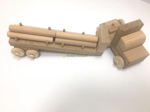 <div style=margin-left:10px><h1>Деревянная машина Тягач В 12</h1><p><a href="/catalog/ukrasheniya/">Прикраси</a> » <a href="/catalog/ukrasheniya/igrushki/">Iграшки</a></p><i class="fa fa-map-marker"></i> Киевская область, Киев<br /><br /><div class="socdata"><script src="//yastatic.net/es5-shims/0.0.2/es5-shims.min.js"></script>
                                            <script src="//yastatic.net/share2/share.js"></script>
                                            <div class="ya-share2" data-services="facebook,gplus,twitter,lj,viber,whatsapp,skype" data-counter=""></div></div>