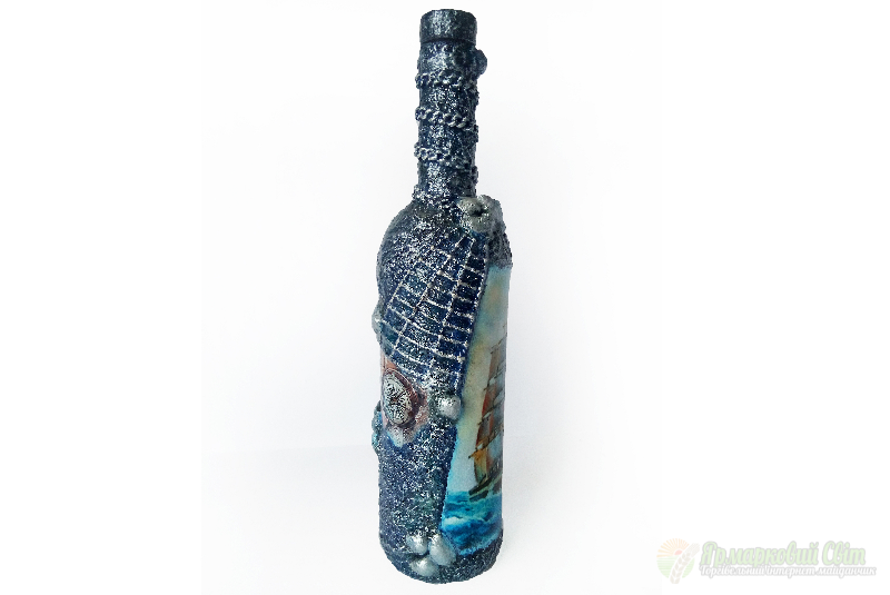 <div style=margin-left:10px><h1>Декор бутылки в подарок моряку Сувениры морской тематики</h1><p><a href="/catalog/podarki--suveniry/">Подарунки, сувеніри</a> » <a href="/catalog/podarki--suveniry/podarki/">Подарунки</a></p><i class="fa fa-map-marker"></i> Донецкая область, Мариуполь<br /><br /><div class="socdata"><script src="//yastatic.net/es5-shims/0.0.2/es5-shims.min.js"></script>
                                            <script src="//yastatic.net/share2/share.js"></script>
                                            <div class="ya-share2" data-services="facebook,gplus,twitter,lj,viber,whatsapp,skype" data-counter=""></div></div>