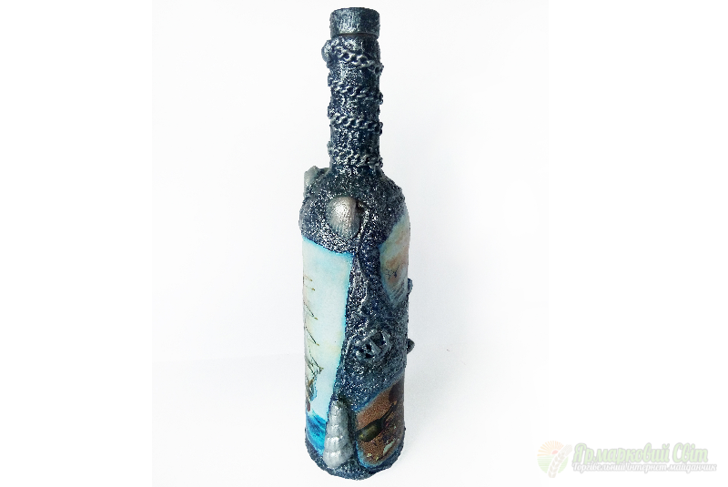 <div style=margin-left:10px><h1>Декор бутылки в подарок моряку Сувениры морской тематики</h1><p><a href="/catalog/podarki--suveniry/">Подарунки, сувеніри</a> » <a href="/catalog/podarki--suveniry/podarki/">Подарунки</a></p><i class="fa fa-map-marker"></i> Донецкая область, Мариуполь<br /><br /><div class="socdata"><script src="//yastatic.net/es5-shims/0.0.2/es5-shims.min.js"></script>
                                            <script src="//yastatic.net/share2/share.js"></script>
                                            <div class="ya-share2" data-services="facebook,gplus,twitter,lj,viber,whatsapp,skype" data-counter=""></div></div>