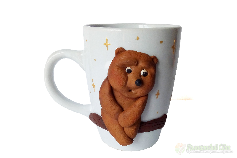 <div style=margin-left:10px><h1>Кружка сувенирная с фигуркой медвежонка из мультфильма «Ежик в тумане»</h1><p><a href="/catalog/podarki--suveniry/">Подарунки, сувеніри</a> » <a href="/catalog/podarki--suveniry/podarki/">Подарунки</a></p><i class="fa fa-map-marker"></i> Донецкая область, Мариуполь<br /><br /><div class="socdata"><script src="//yastatic.net/es5-shims/0.0.2/es5-shims.min.js"></script>
                                            <script src="//yastatic.net/share2/share.js"></script>
                                            <div class="ya-share2" data-services="facebook,gplus,twitter,lj,viber,whatsapp,skype" data-counter=""></div></div>