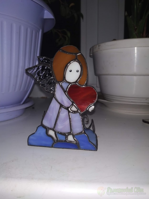 <div style=margin-left:10px><h1>Подсвечник витражный Ангел</h1><p><a href="/catalog/podarki--suveniry/">Подарунки, сувеніри</a> » <a href="/catalog/podarki--suveniry/suveniry/">Сувеніри</a></p><i class="fa fa-map-marker"></i> Закарпатская область, Мукачево<br /><br /><div class="socdata"><script src="//yastatic.net/es5-shims/0.0.2/es5-shims.min.js"></script>
                                            <script src="//yastatic.net/share2/share.js"></script>
                                            <div class="ya-share2" data-services="facebook,gplus,twitter,lj,viber,whatsapp,skype" data-counter=""></div></div>