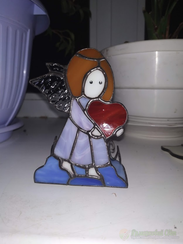 <div style=margin-left:10px><h1>Подсвечник витражный Ангел</h1><p><a href="/catalog/podarki--suveniry/">Подарунки, сувеніри</a> » <a href="/catalog/podarki--suveniry/suveniry/">Сувеніри</a></p><i class="fa fa-map-marker"></i> Закарпатская область, Мукачево<br /><br /><div class="socdata"><script src="//yastatic.net/es5-shims/0.0.2/es5-shims.min.js"></script>
                                            <script src="//yastatic.net/share2/share.js"></script>
                                            <div class="ya-share2" data-services="facebook,gplus,twitter,lj,viber,whatsapp,skype" data-counter=""></div></div>