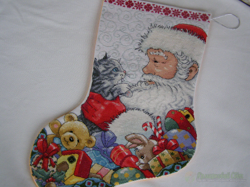 <div style=margin-left:10px><h1>Вышитые новогодние сапожки.</h1><p><a href="/catalog/podarki--suveniry/">Подарунки, сувеніри</a> » <a href="/catalog/podarki--suveniry/podarki/">Подарунки</a></p><i class="fa fa-map-marker"></i> Киевская область, Киев<br /><br /><div class="socdata"><script src="//yastatic.net/es5-shims/0.0.2/es5-shims.min.js"></script>
                                            <script src="//yastatic.net/share2/share.js"></script>
                                            <div class="ya-share2" data-services="facebook,gplus,twitter,lj,viber,whatsapp,skype" data-counter=""></div></div>