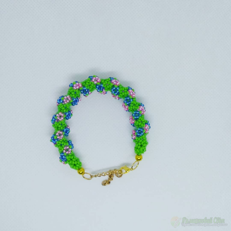 <div style=margin-left:10px><h1>Браслет "Полянка"</h1><p><a href="/catalog/bijuteriya/">Біжутерія</a> » <a href="/catalog/bijuteriya/braslety/">Браслети</a></p><i class="fa fa-map-marker"></i> Киевская область, Гнидын<br /><br /><div class="socdata"><script src="//yastatic.net/es5-shims/0.0.2/es5-shims.min.js"></script>
                                            <script src="//yastatic.net/share2/share.js"></script>
                                            <div class="ya-share2" data-services="facebook,gplus,twitter,lj,viber,whatsapp,skype" data-counter=""></div></div>