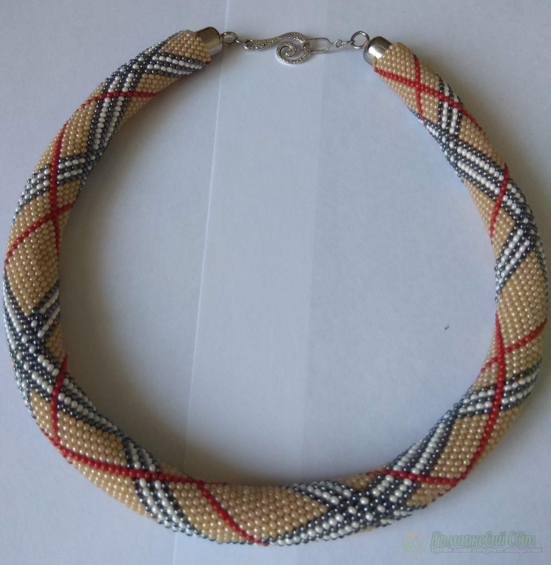 <div style=margin-left:10px><h1>Жгут из бисера</h1><p><a href="/catalog/ukrasheniya/">Прикраси</a> » <a href="/catalog/ukrasheniya/aksessuary/">Аксесуари</a></p><i class="fa fa-map-marker"></i> Киевская область, Киев<br /><br /><div class="socdata"><script src="//yastatic.net/es5-shims/0.0.2/es5-shims.min.js"></script>
                                            <script src="//yastatic.net/share2/share.js"></script>
                                            <div class="ya-share2" data-services="facebook,gplus,twitter,lj,viber,whatsapp,skype" data-counter=""></div></div>